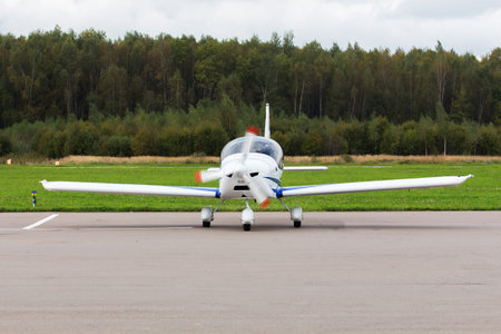 Private jet is parked on a summer day