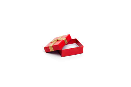 opened red gift box with gold ribbon