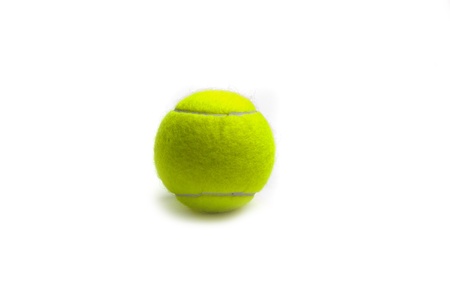 green isolated  tennis ball on white backgroundの写真素材