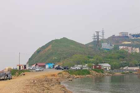Photos in which the city by the sea is depicted area.の写真素材
