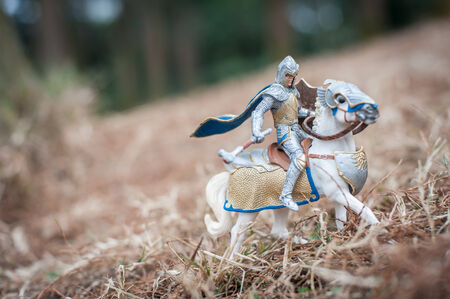 figurine of a knight riding on horseの写真素材