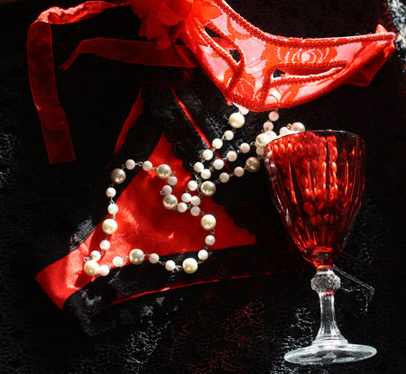 mask women's panties heart on black background heart made of pearl beadsの写真素材