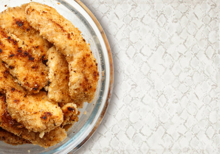 slices of chicken fillet on a plate closeupの写真素材