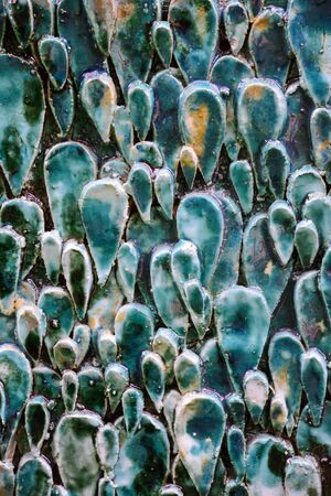 texture of turquoise drops on the wallの写真素材