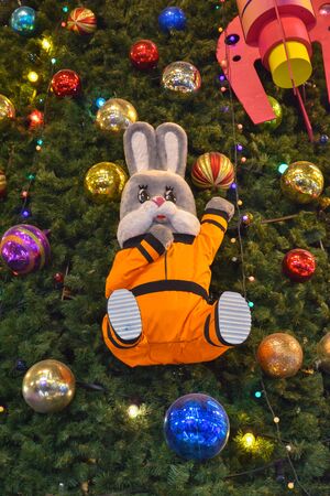 Stepashka on Christmas tree in GUM, hare in spacesuit on Christmas tree, Stepashka hare on the Christmas tree, happy, moscow, red, russia, sight, season, state, landmark, decoration, new year, new, russian, fir tree, tree, film, russian federation, decorative, christmas, square, celebration, vintage, indoor, animated, style, gum, fir-tree, mood, city, winter, tourism, monument, holiday, interior, tourist, decor, design, vacation, place, department, lights, xmas, architecture, famous, retro, store, soviet, attraction, culture, travelの写真素材