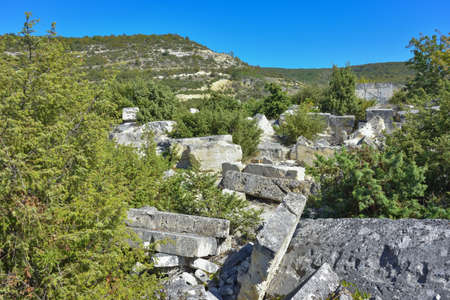 Big stone blocks. Abandoned quarry. stones in an abandoned quarryの写真素材