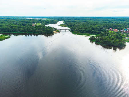 Flight over the river, river in the forest from a bird eye view, top viewの写真素材