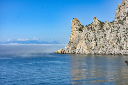 rocky shore of Black Sea, landscape with rocks on seashore, rocks sticking out of sea
