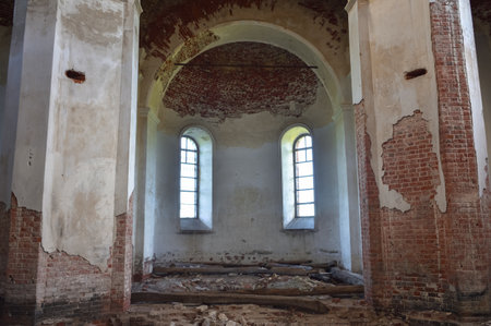 window arch in an abandoned templeの写真素材