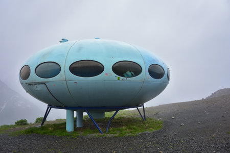 Dombay, Russia - June 09, 2022: hotel is in the form of a flying saucer on the mountain, flying saucer in the mountains, UFO in the mountainsのeditorial素材