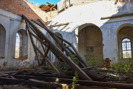 the interior of abandoned and ruined building, disheveled church in Russiaの写真素材