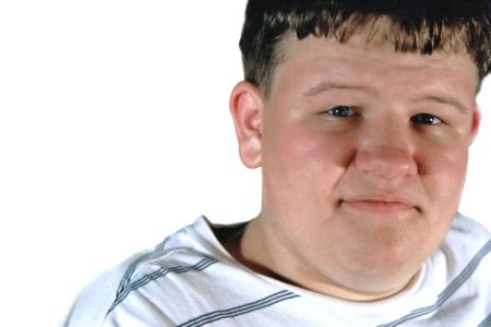 Horizontal portrait of teenage boy with white background.の写真素材