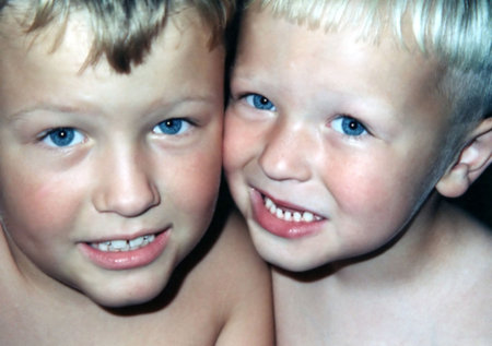 Closeup portrait of two young brothers.の写真素材