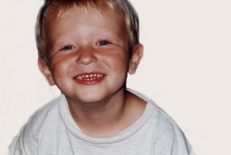 Portrait of happy young boy.の写真素材