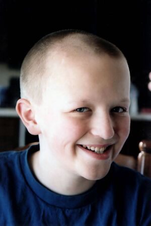 Portrait of preteen boy with new short haircut.の写真素材