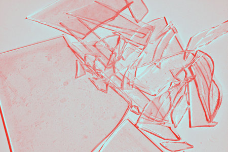 Broken glass tinted red.の写真素材