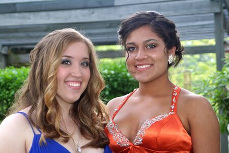 Portrait of Sisters in Prom Gowns Closeupの写真素材