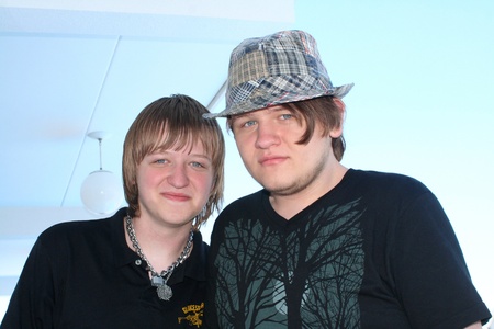 Two teenage brothers in an outdoor setting.の写真素材