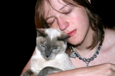 Affectionate Teen And Cat の写真素材