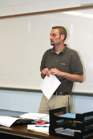 Teacher Speaking At Front Of Classの写真素材