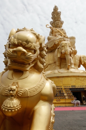 Golden Buddha statue on Mount Emei summit in chinaのeditorial素材