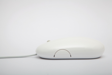Computer mouse sideview isolated on the white backgroundの写真素材