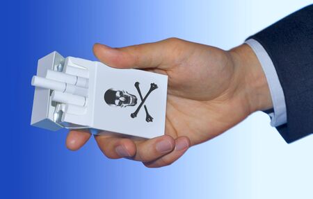 danger pack of cigarettes on a man's hand with pathの写真素材