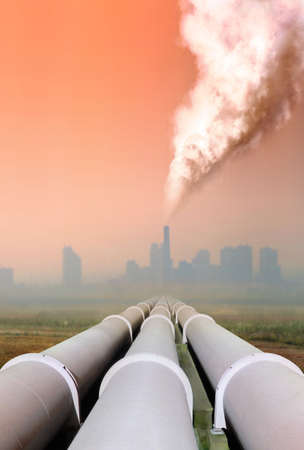 gas pipe line and atmospheric air pollution from factoryの写真素材