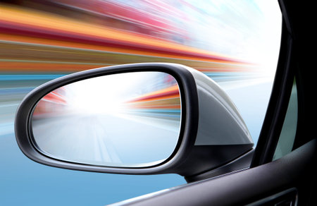 speed car driving at high speed on empty road - motion blurの写真素材