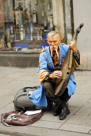 KRAKOW, POLAND - JUNE 13: Unknown Ukrainian gusla player on June 13, 2007 in Krakow.