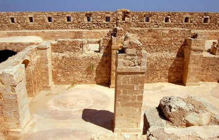 wall and column in Firka fortress at sun day, Crete.の写真素材