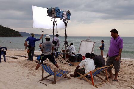 PATTAYA, THAILAND - DECEMBER 22: Team of professionals shoots film on the coast on December 22, 2013 in Pattaya.のeditorial素材