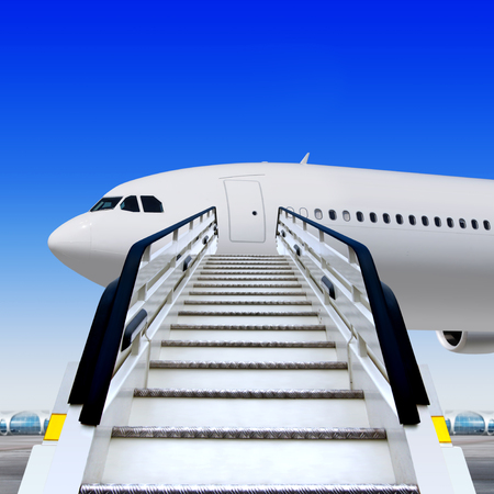 frontal view of white ramp in airport near the planeの写真素材