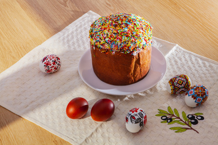 Painted Colorful Easter Eggs and egg breadの写真素材