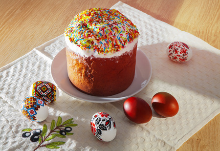Painted Colorful Easter Eggs and rich breadの写真素材