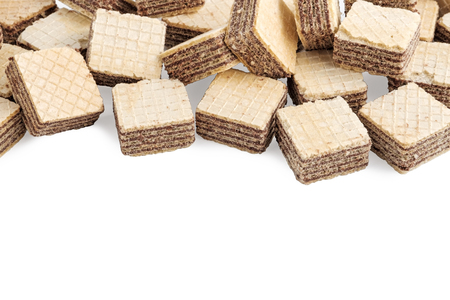 heap square wafer biscuits isolated on white background.の写真素材
