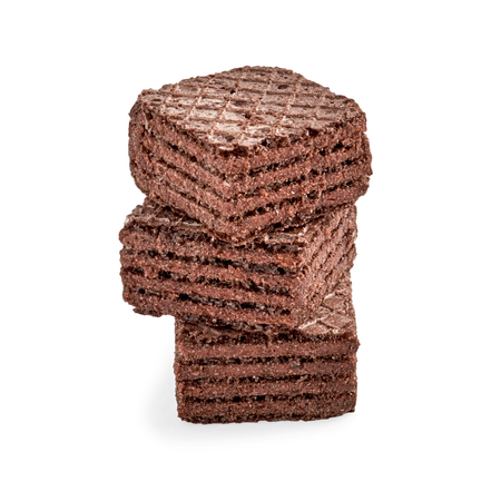 Stack of chocolate square brownie wafer biscuits isolated on white backdrop. closeup viewの写真素材