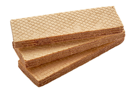 Stack of three crispy wafer biscuits isolated on white backdrop. close up viewの写真素材