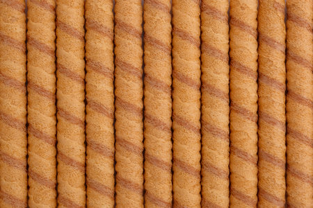 wafer roll sticks as background, view from above. Close-up