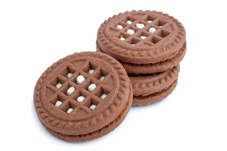 Brown chocolate milky cream filled cookies isolated on whiteの写真素材