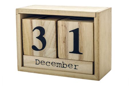 Planner wooden cube with numbers, 31 day of the month of December, winter isolated on white background.の写真素材