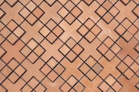 Unusual pattern of brick wall, front view. in redの写真素材