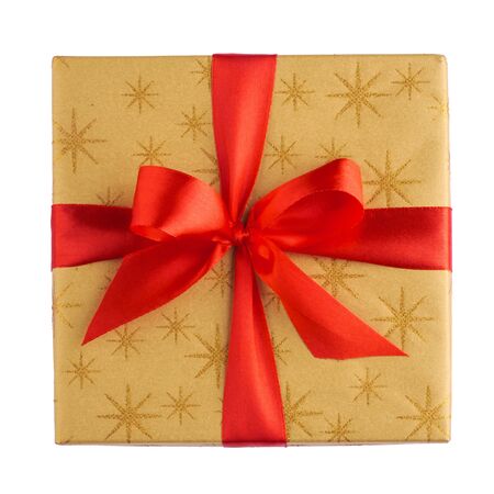 Red gift or present box with golden colored top and red ribbon bow isolated on white background, flatlay, top view, for sales, birthday, mother day or christmasの写真素材