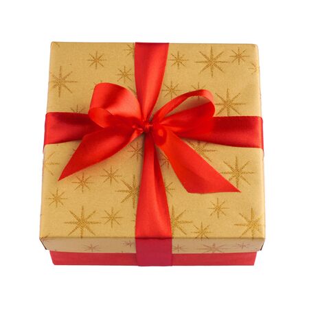 Red gift or present box with golden colored top and red ribbon bow isolated on white background, for sales, birthday, mother day or christmas, closeup viewの写真素材