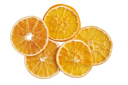 Stack of dried orange slices isolated on white background. Top view, flatlay. no shadowsの写真素材