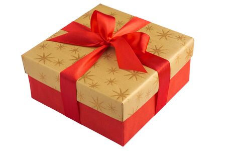 Red gift or present box with golden colored top and red ribbon bow isolated on white background, for sales, birthday, mother day or christmasの写真素材