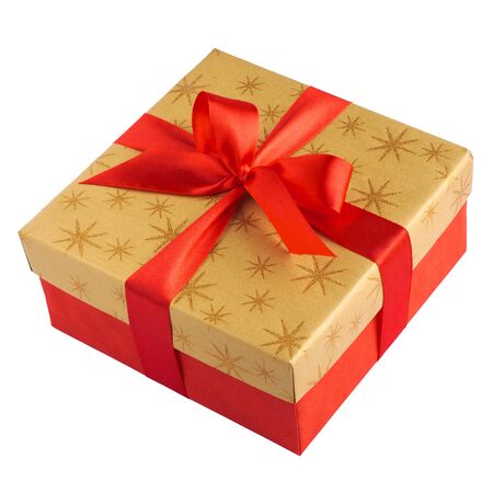 Red gift or present box with golden colored top and red ribbon bow isolated on white background, for sales, birthday, mother day or christmasの写真素材