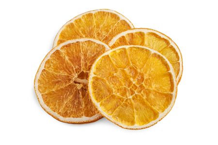 Stack of dried orange slices isolated on white background. Top view, flatlay. no shadowsの写真素材