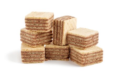 Heap of square wafer biscuits isolated on white backgroundの写真素材