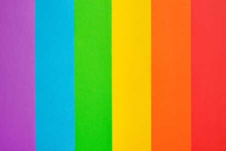 rainbow colored lgbt flag paper background. Pride day concept, flat lay, copy space for designの写真素材